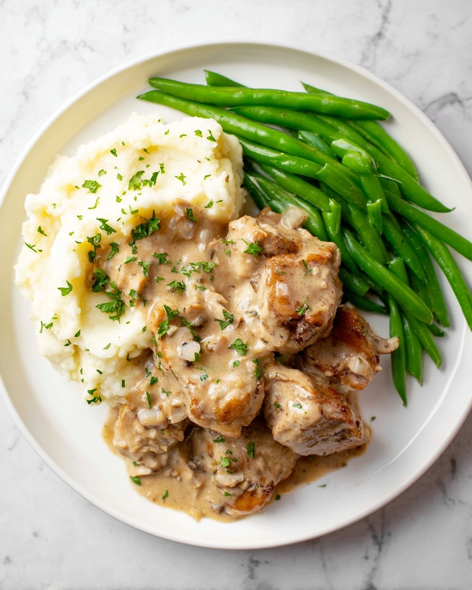 Boursin Pork Tenderloin with Herb Garlic Sauce Recipe - Recipe Image