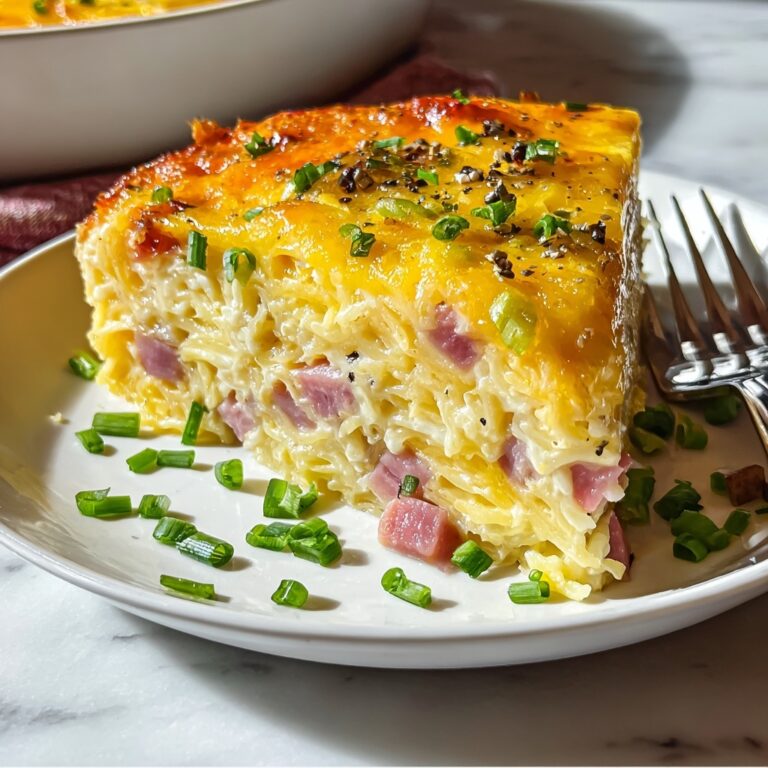 Hash Brown Egg Casserole with Sausage, Cheddar, and Veggies Recipe