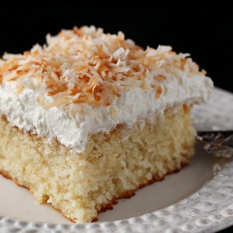 Cream of Coconut Cake with Flaked Coconut and Cool Whip Recipe